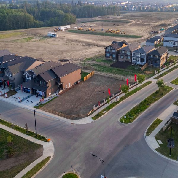 Aerial of showhomes in Trumpeter by Big Lake 2025